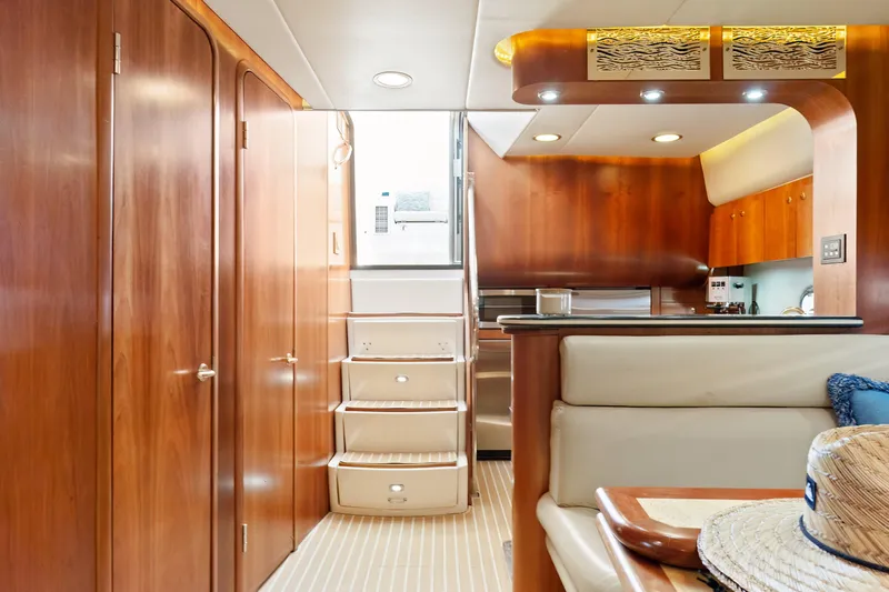 Cerulean Yacht Photos Pics Interior of 2000 Tiara Yachts 52 Express Cruiser with wooden cabinetry and modern design.