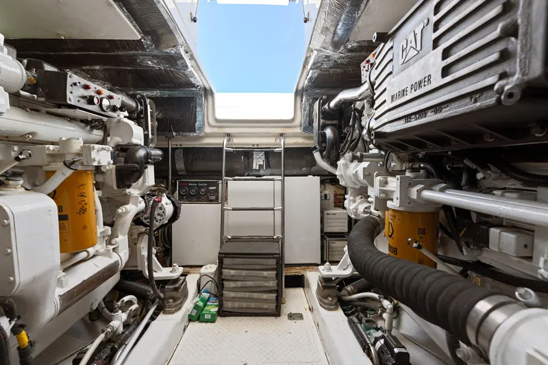 Cerulean Yacht Photos Pics Engine room of 2000 Tiara Yachts 52 Express Cruiser with CAT marine power systems.
