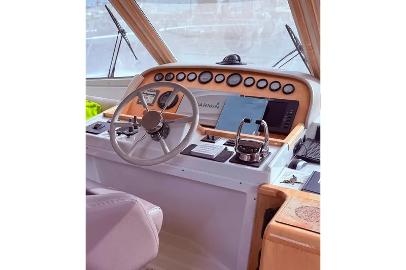 Gabbiano Yacht Photos Pics Navigator 53 yacht helm with steering wheel and navigation controls, year 2000 model.