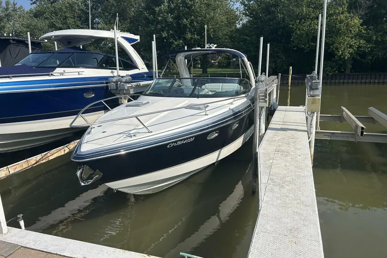  Yacht Photos Pics 2020 Formula 310SS boat docked, featuring sleek design and modern amenities.