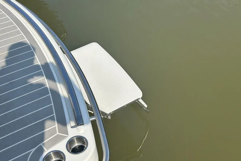  Yacht Photos Pics 2020 Formula 310SS boat swim platform with stainless steel railing and cup holders.