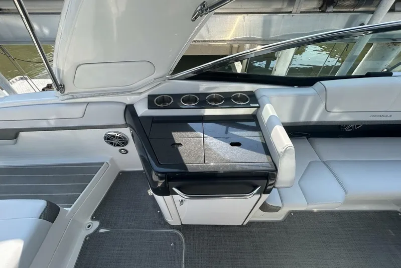  Yacht Photos Pics 2020 Formula 310SS boat interior with sleek seating and modern design.