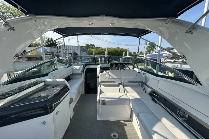  Yacht Photos Pics Luxurious 2020 Formula 310SS boat interior with spacious seating and sleek design.