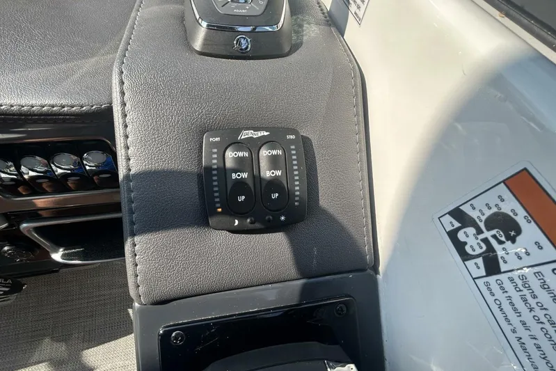  Yacht Photos Pics Control panel of a 2020 Formula 310SS boat with trim tab switches.