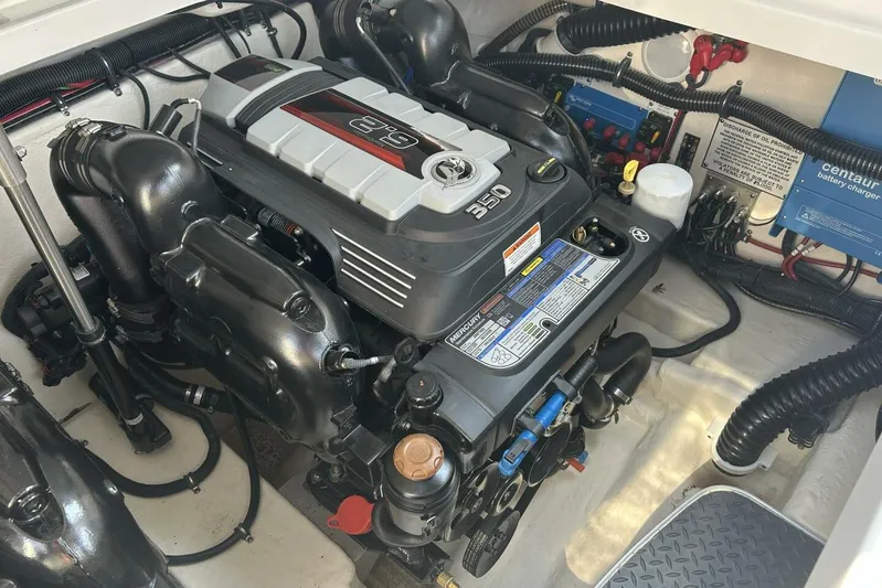  Yacht Photos Pics Engine compartment of a 2020 Formula 310SS boat, featuring a Mercury 350 engine.