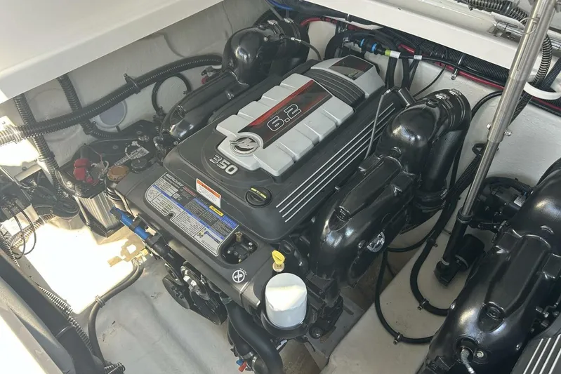 Yacht Photos Pics Engine compartment of a 2020 Formula 310SS boat, featuring a 6.2L 350 horsepower engine.