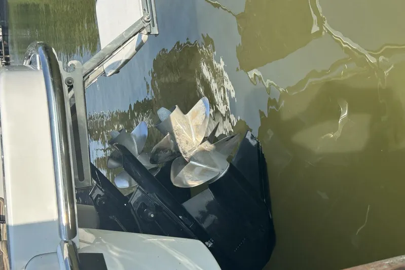  Yacht Photos Pics 2020 Formula 310SS boat propeller submerged in water.