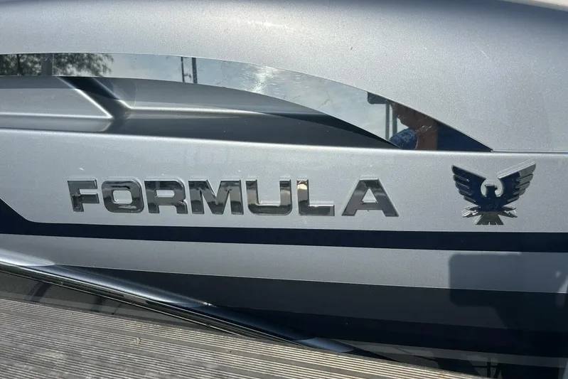 Yacht Photos Pics Silver 2020 Formula 310SS boat logo with eagle emblem.