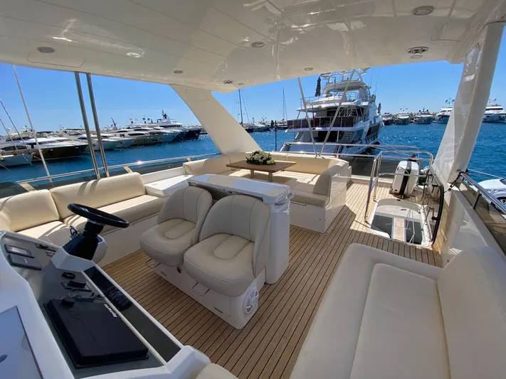  Yacht Photos Pics Luxurious 2008 Princess 62 Flybridge yacht interior with elegant seating and ocean view.