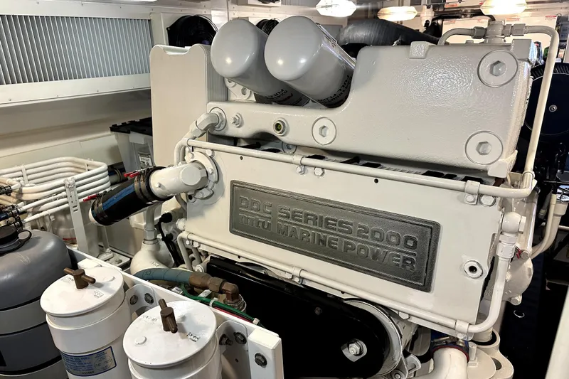 Reel Inn Yacht Photos Pics Engine room of 2003 Viking 61 Convertible yacht with DDC Series 2000 marine engine.