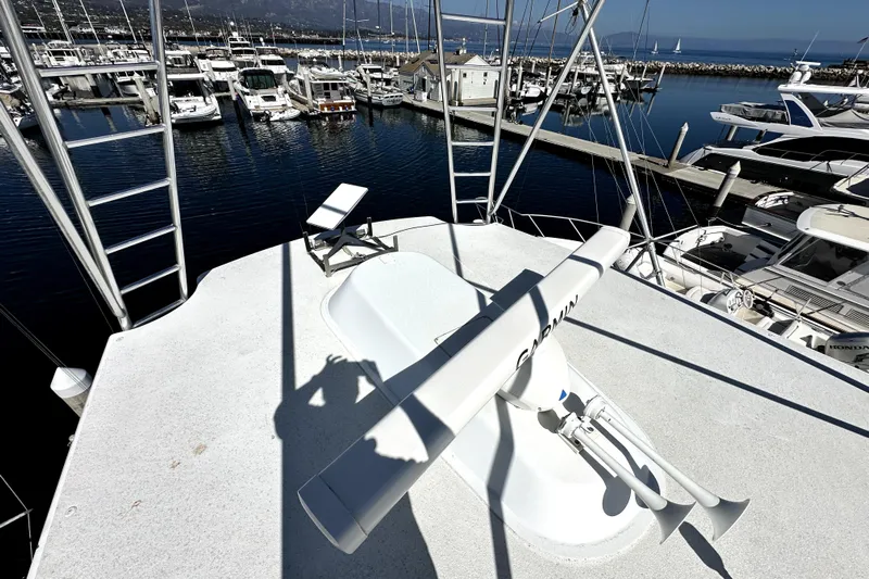 Reel Inn Yacht Photos Pics Rooftop view of 2003 Viking 61 Convertible yacht in marina, featuring radar and horn.