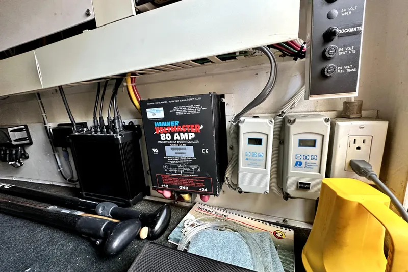 Reel Inn Yacht Photos Pics Electrical panel in a 2003 Viking 61 Convertible boat with various controls and equipment.