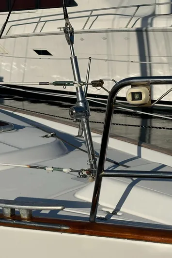 Pono Yacht Photos Pics Close-up of a 2006 Beneteau 423 yacht deck with rigging and railing details.