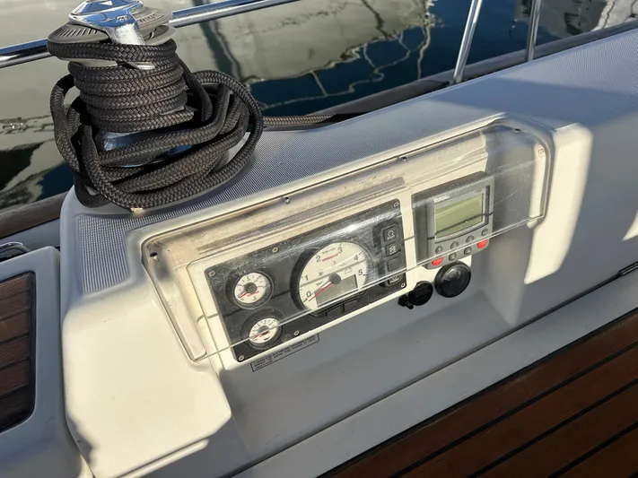 Pono Yacht Photos Pics Control panel of a 2006 Beneteau 423 sailboat with coiled rope.