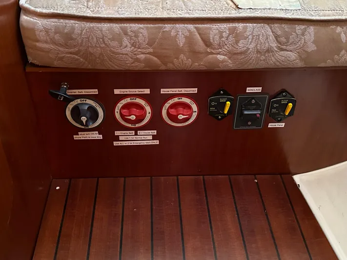 Pono Yacht Photos Pics Control panel on a 2006 Beneteau 423 yacht, featuring battery switches and circuit breakers.