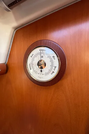 Pono Yacht Photos Pics Barometer on 2006 Beneteau 423 yacht, mounted on wooden panel.