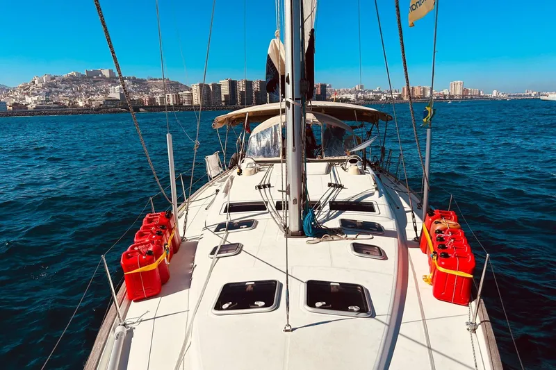  Yacht Photos Pics Sailing on a 2006 Beneteau 473 yacht with cityscape and ocean views.
