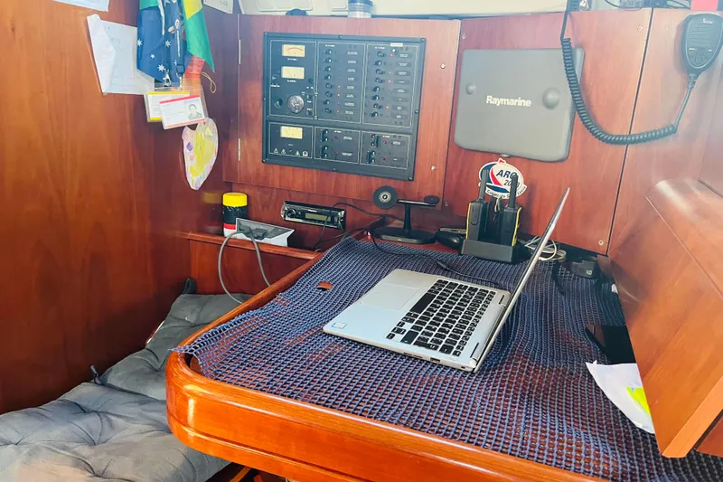  Yacht Photos Pics Navigation station on a 2006 Beneteau 473 yacht with laptop and control panels.