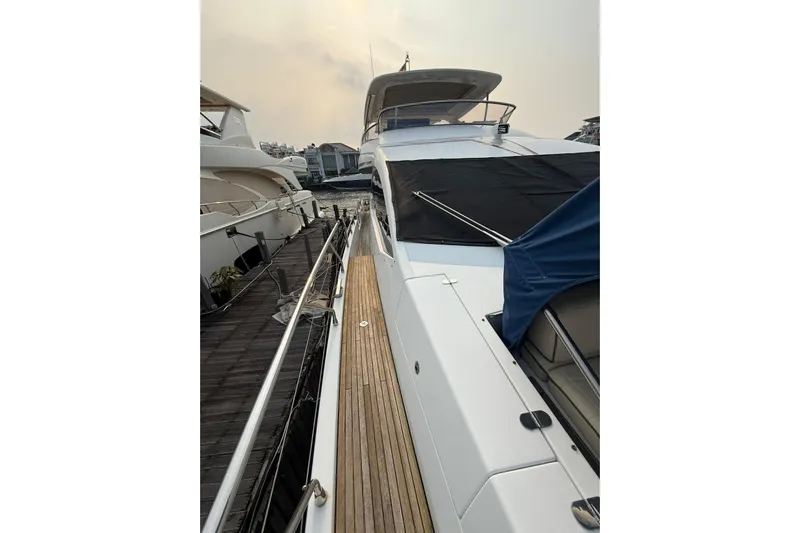  Yacht Photos Pics 2014 Azimut 80 yacht docked, showcasing sleek design and spacious deck.