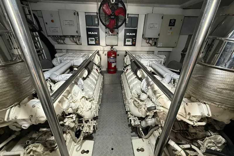  Yacht Photos Pics Engine room of 2014 Azimut 80 yacht featuring dual MAN engines and control panels.