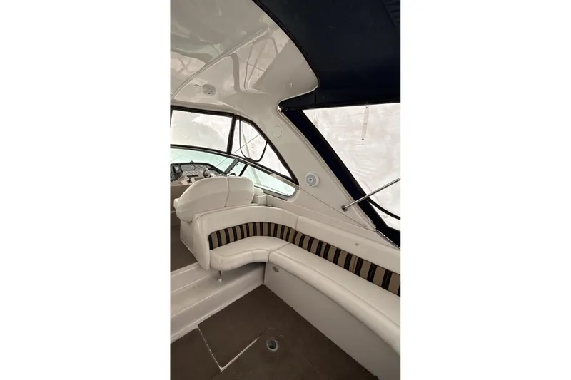  Yacht Photos Pics Interior of 2007 Four Winns 378 Vista yacht with plush seating and helm view.