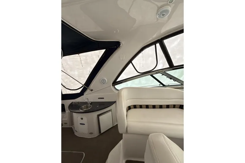  Yacht Photos Pics Interior of 2007 Four Winns 378 Vista yacht with seating and kitchenette.