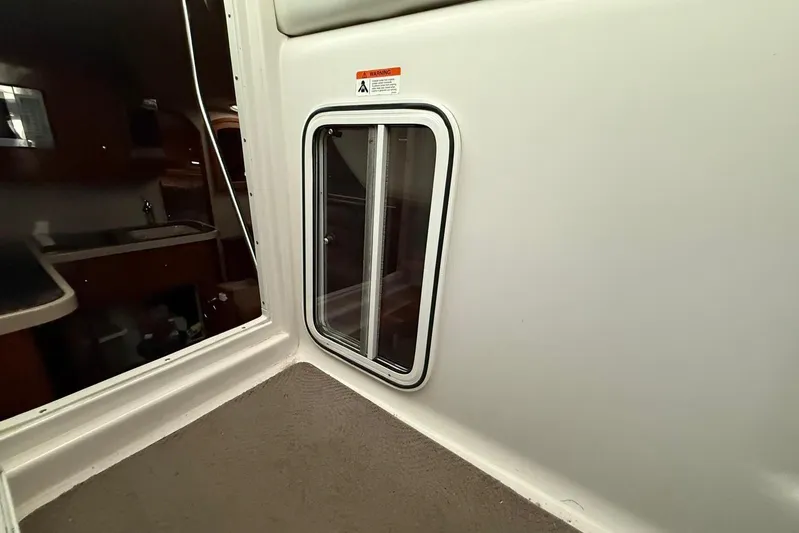  Yacht Photos Pics 2007 Four Winns 378 Vista cabin interior with window and kitchenette view.