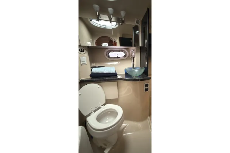  Yacht Photos Pics 2007 Four Winns 378 Vista yacht bathroom with modern sink and toilet.