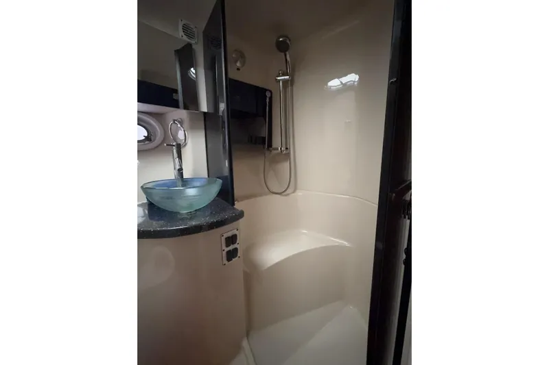  Yacht Photos Pics Luxurious bathroom in 2007 Four Winns 378 Vista yacht with modern glass sink and shower.