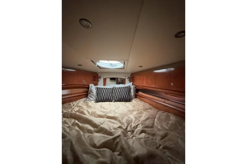  Yacht Photos Pics Luxurious cabin interior of 2007 Four Winns 378 Vista yacht with cozy bedding.