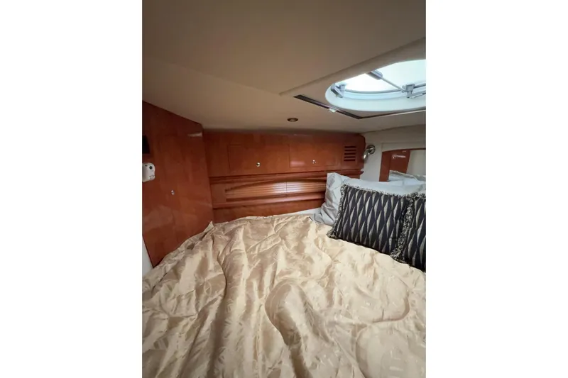  Yacht Photos Pics Luxurious cabin interior of 2007 Four Winns 378 Vista yacht with plush bedding.
