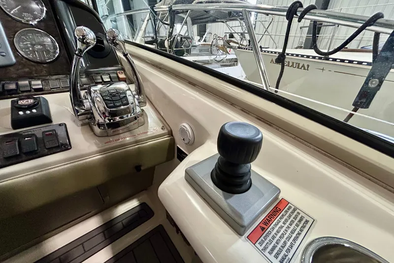  Yacht Photos Pics Control panel of a 2008 Sea Ray 44 Sundancer yacht with joystick and throttle levers.
