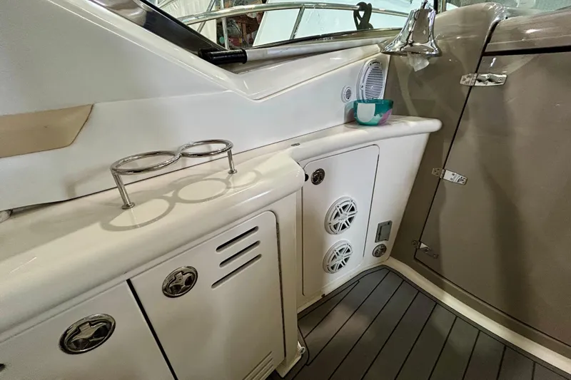  Yacht Photos Pics 2008 Sea Ray 44 Sundancer interior with cup holders and storage compartments.