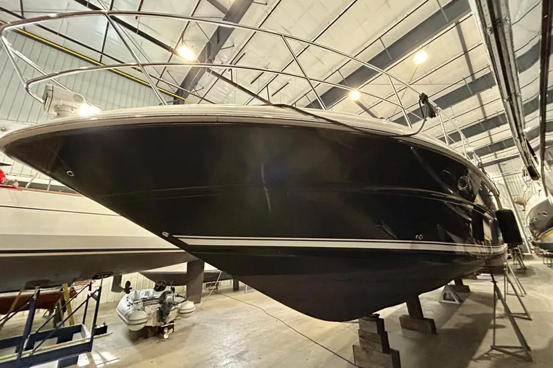  Yacht Photos Pics 2008 Sea Ray 44 Sundancer yacht in indoor storage, viewed from below.