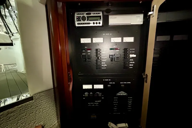  Yacht Photos Pics Electrical control panel inside 2008 Sea Ray 44 Sundancer yacht, featuring various switches and meters.