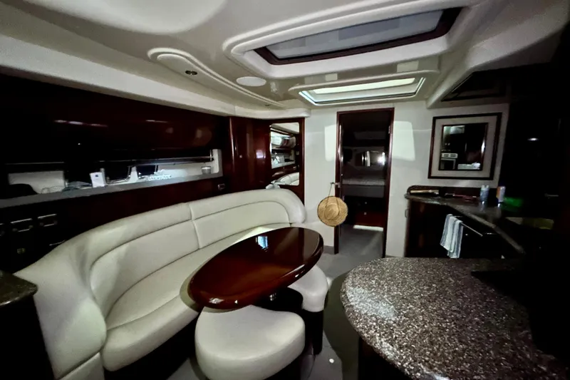  Yacht Photos Pics Luxurious interior of a 2008 Sea Ray 44 Sundancer yacht with elegant seating and modern amenities.