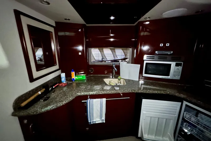  Yacht Photos Pics 2008 Sea Ray 44 Sundancer yacht kitchen with granite countertops and modern appliances.