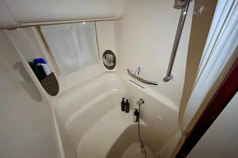  Yacht Photos Pics Bathroom interior of 2008 Sea Ray 44 Sundancer yacht with shower and toiletries.