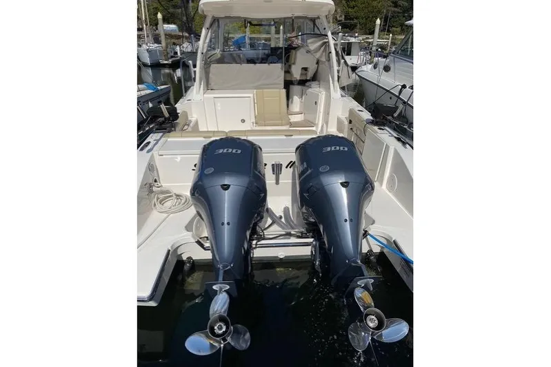 Syd Fishes Yacht Photos Pics 2017 Pursuit OS 325 Offshore boat with dual 300 horsepower engines.