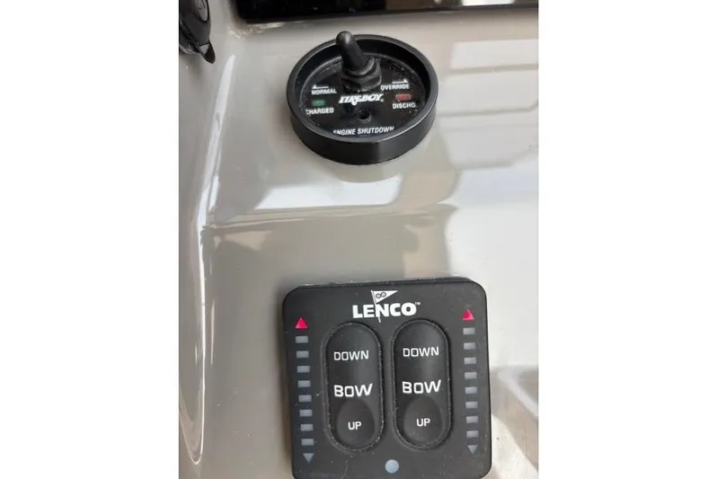 Syd Fishes Yacht Photos Pics Control panel of a 2017 Pursuit OS 325 Offshore boat with Lenco trim tab switches.