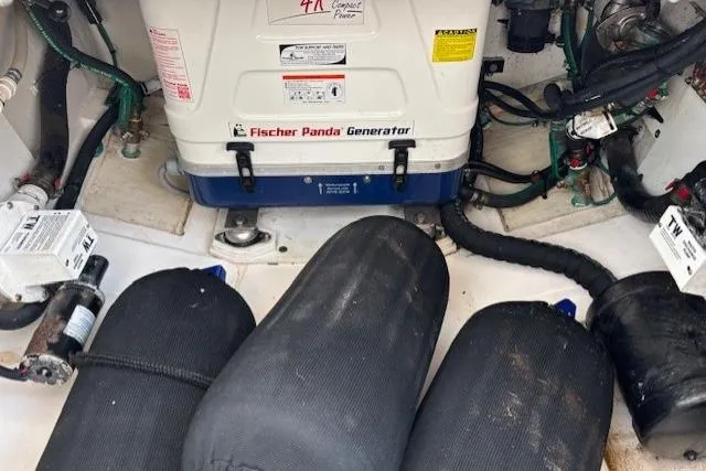 Syd Fishes Yacht Photos Pics 2017 Pursuit OS 325 Offshore engine room with Fischer Panda generator and equipment.