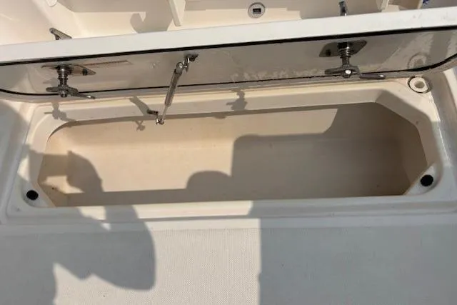 Syd Fishes Yacht Photos Pics Open storage compartment on a 2017 Pursuit OS 325 Offshore boat.
