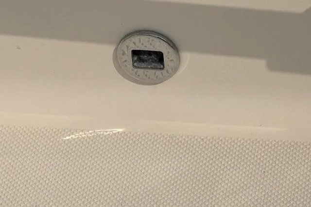 Syd Fishes Yacht Photos Pics Close-up of a 2017 Pursuit OS 325 Offshore boat detail, featuring a metal fitting.