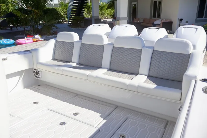 Yacht Photos Pics 2018 Contender 39 Fisharound boat interior with cushioned seating and deck, outdoor setting.