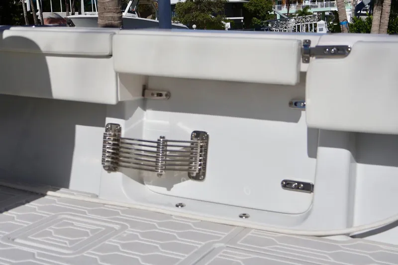  Yacht Photos Pics 2018 Contender 39 Fisharound boat interior with stainless steel fittings and cushioned seating.