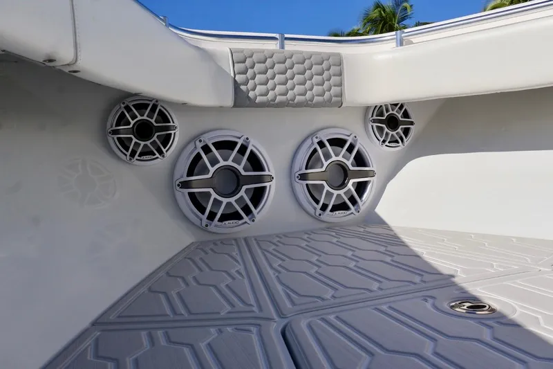  Yacht Photos Pics 2018 Contender 39 Fisharound boat interior with JL Audio speakers and cushioned seating.