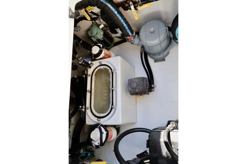  Yacht Photos Pics 2018 Contender 39 Fisharound engine compartment with various mechanical components.