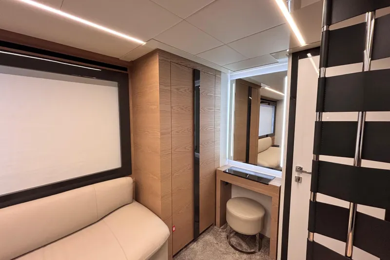  Yacht Photos Pics Luxurious interior of 2019 Pershing 70 yacht with modern design and elegant furnishings.