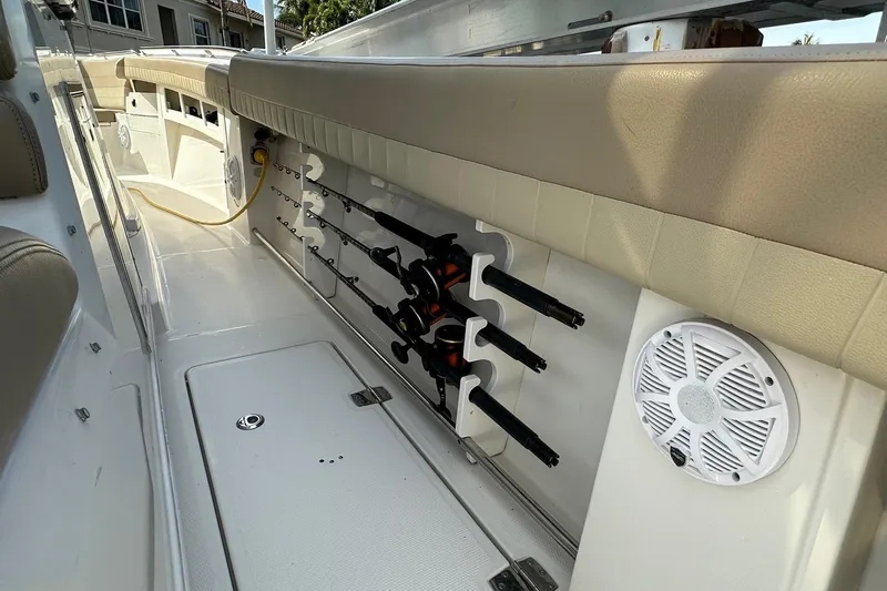  Yacht Photos Pics 2019 Sailfish 360 CC boat interior with rod holders and speaker.