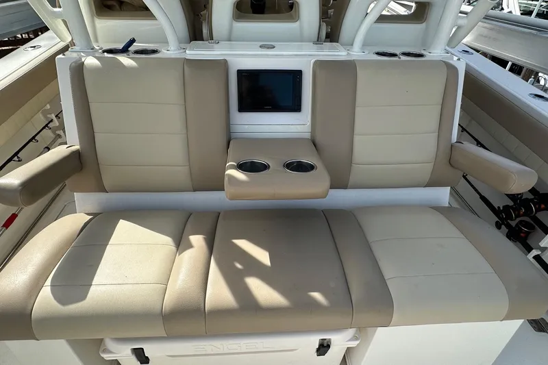  Yacht Photos Pics 2019 Sailfish 360 CC boat seating with beige cushions and cup holders.